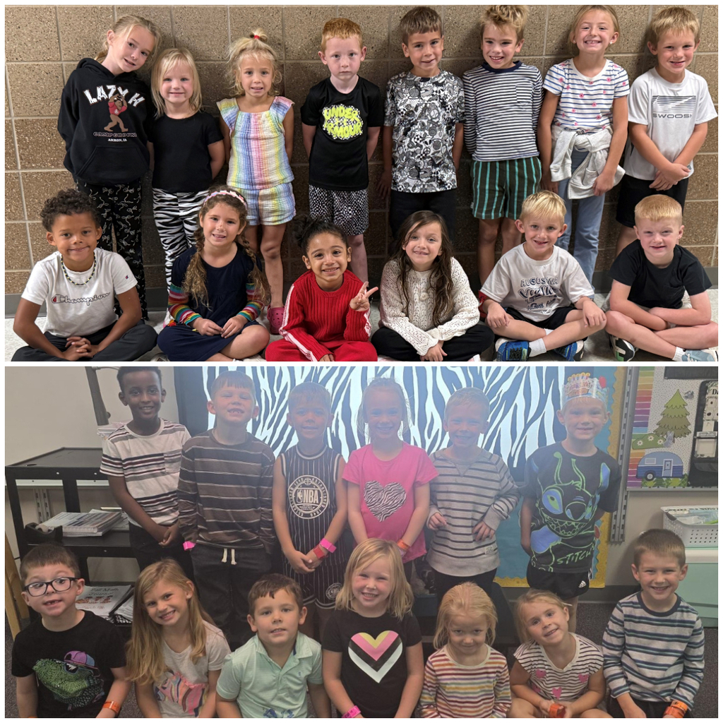 Classroom group photo of students dressed in zebra stripes or black and white for homecoming dress up days.