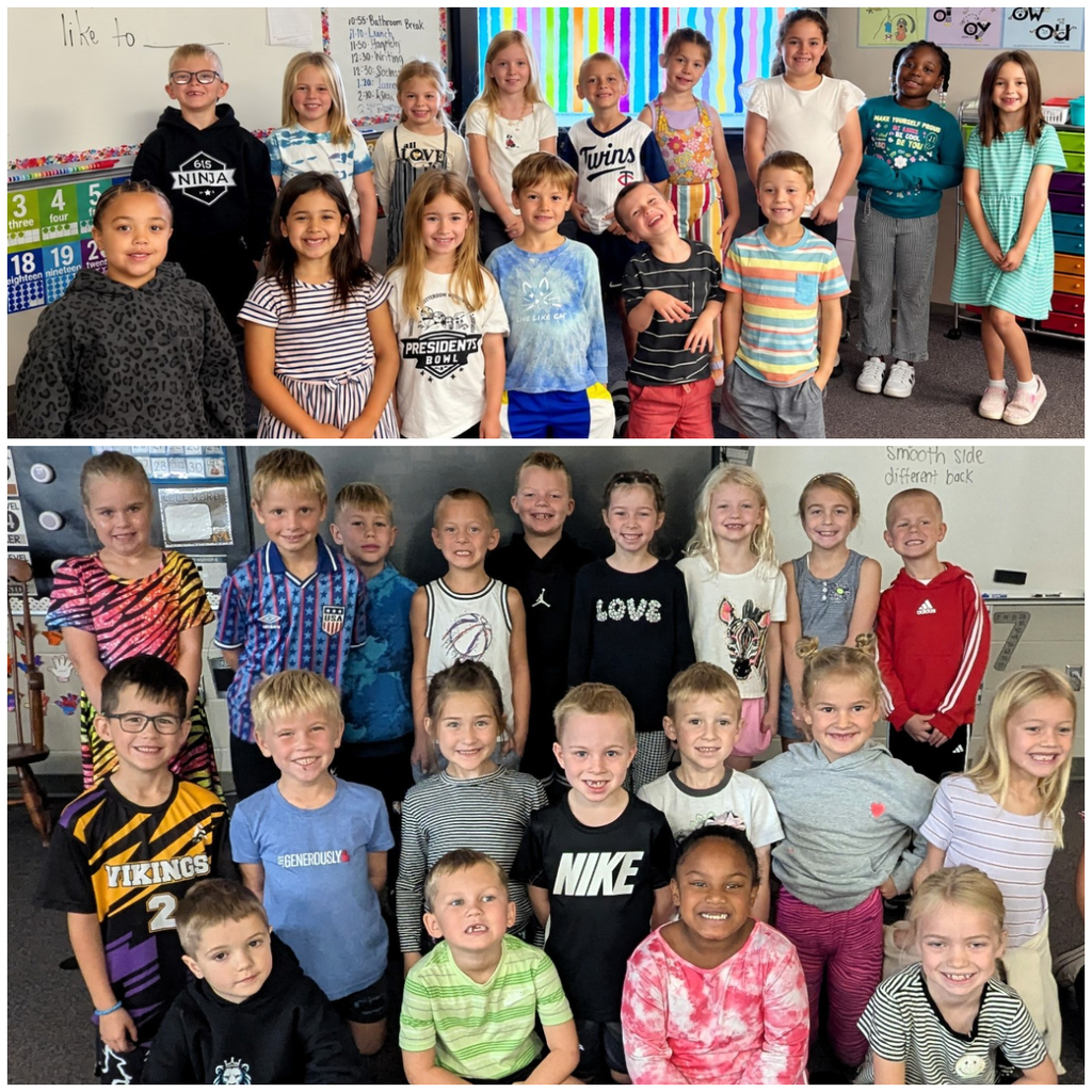Classroom group photo of students dressed in zebra stripes or black and white for homecoming dress up days.