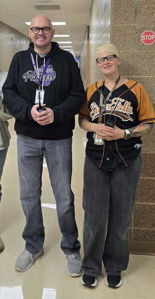 staff member and principal dressed alike 