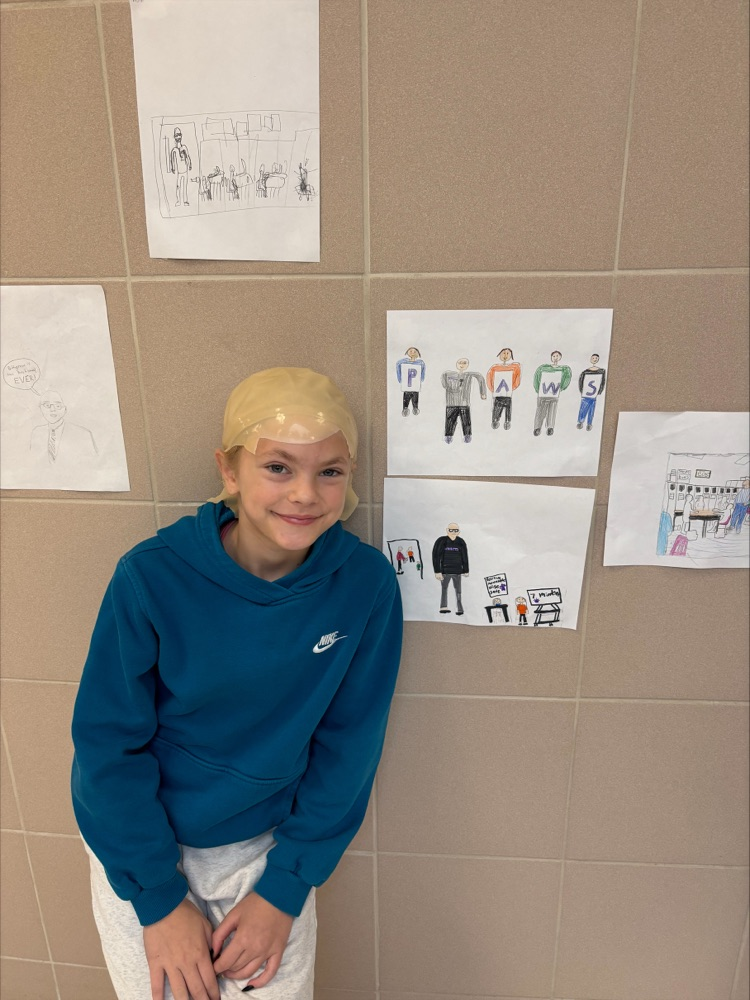 student with a bald wig on 