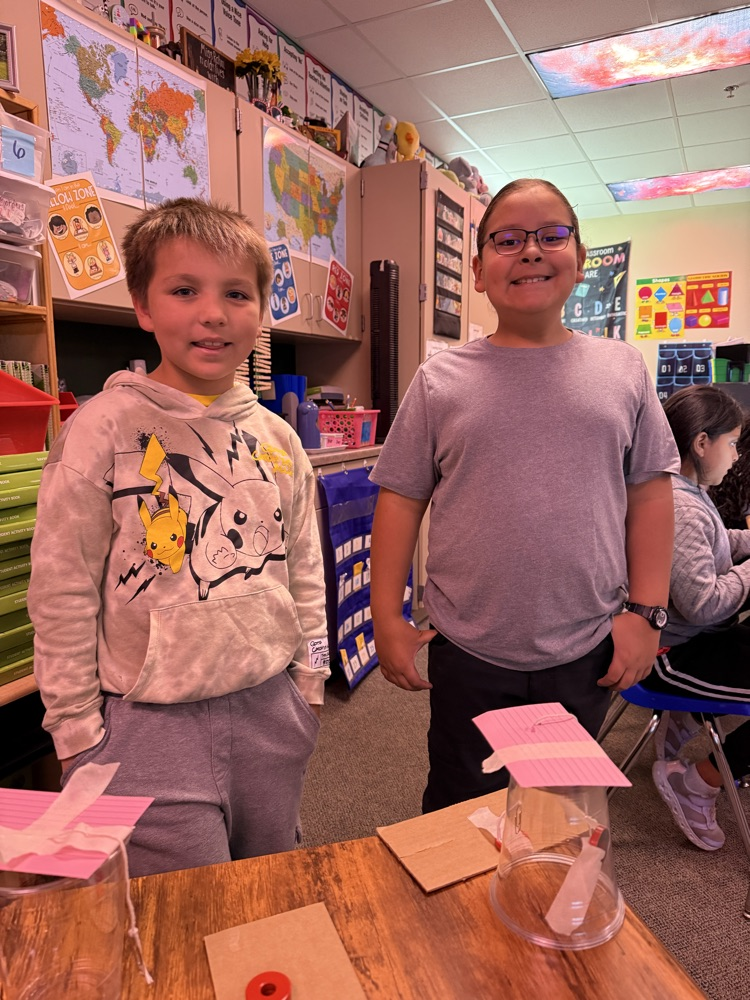 students cooperating in science