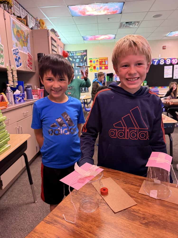 students cooperating in science