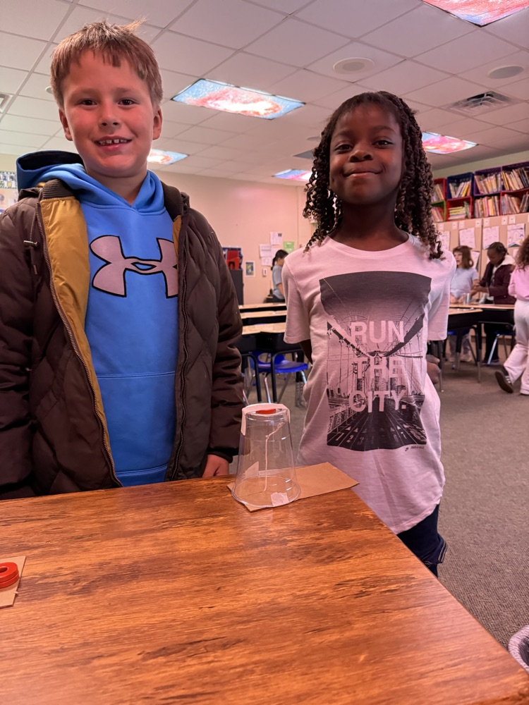 students cooperating in science