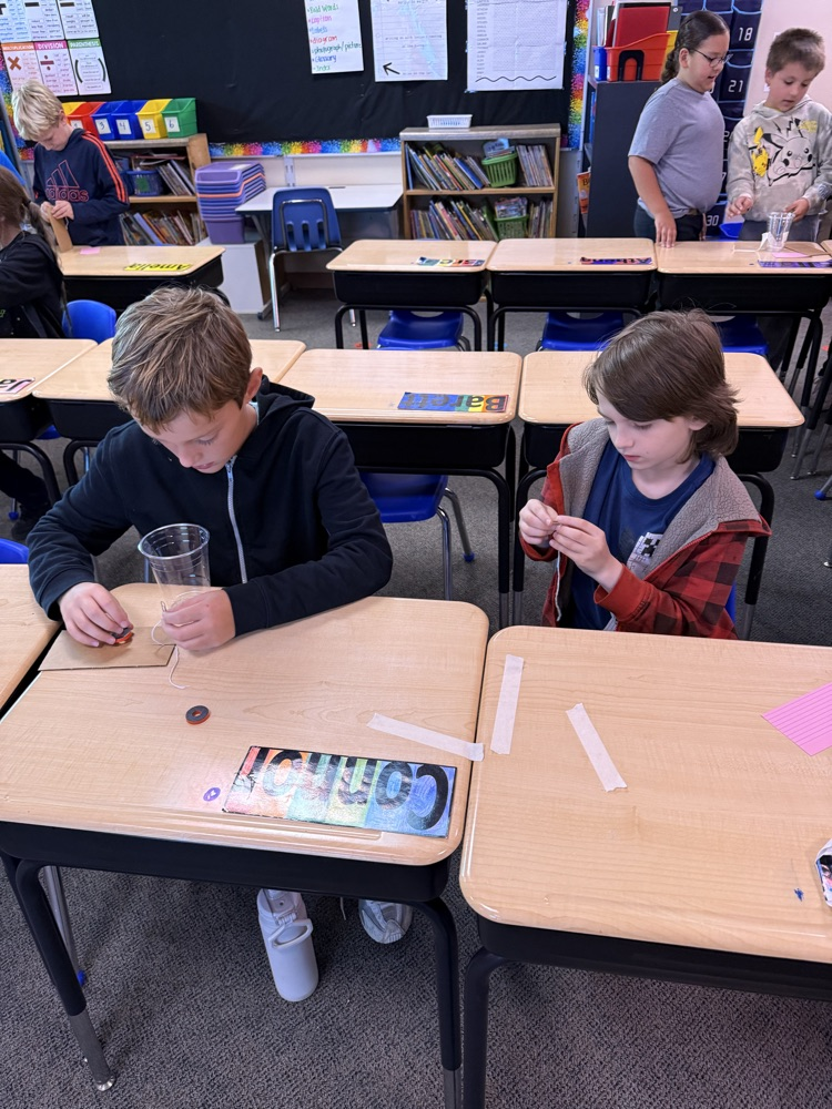 students cooperating in science