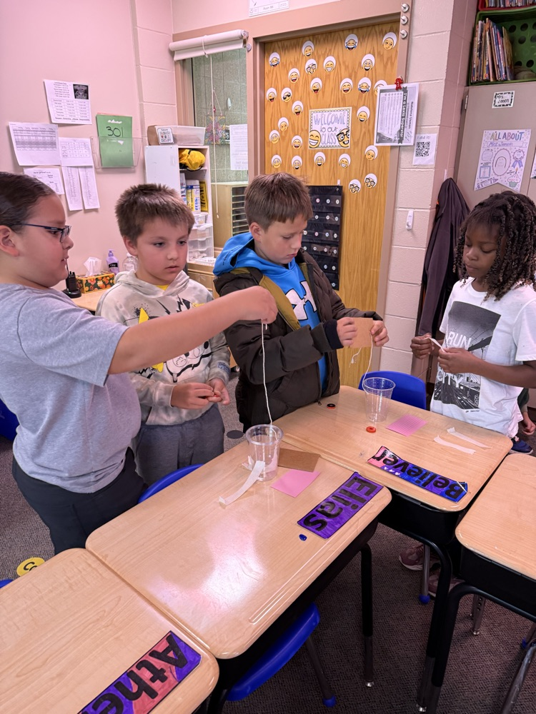students cooperating in science