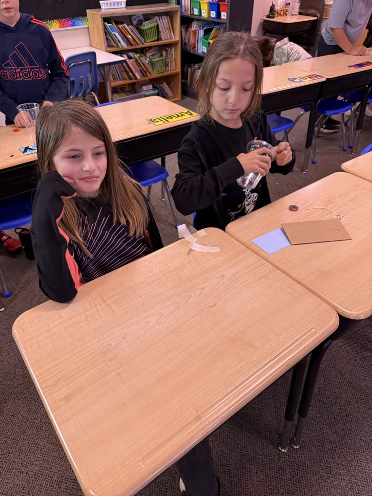 students cooperating in science