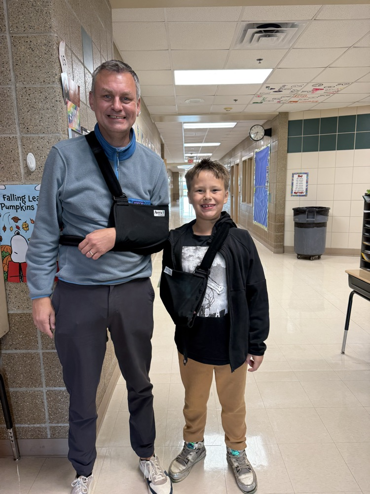 teacher and student in arm slings