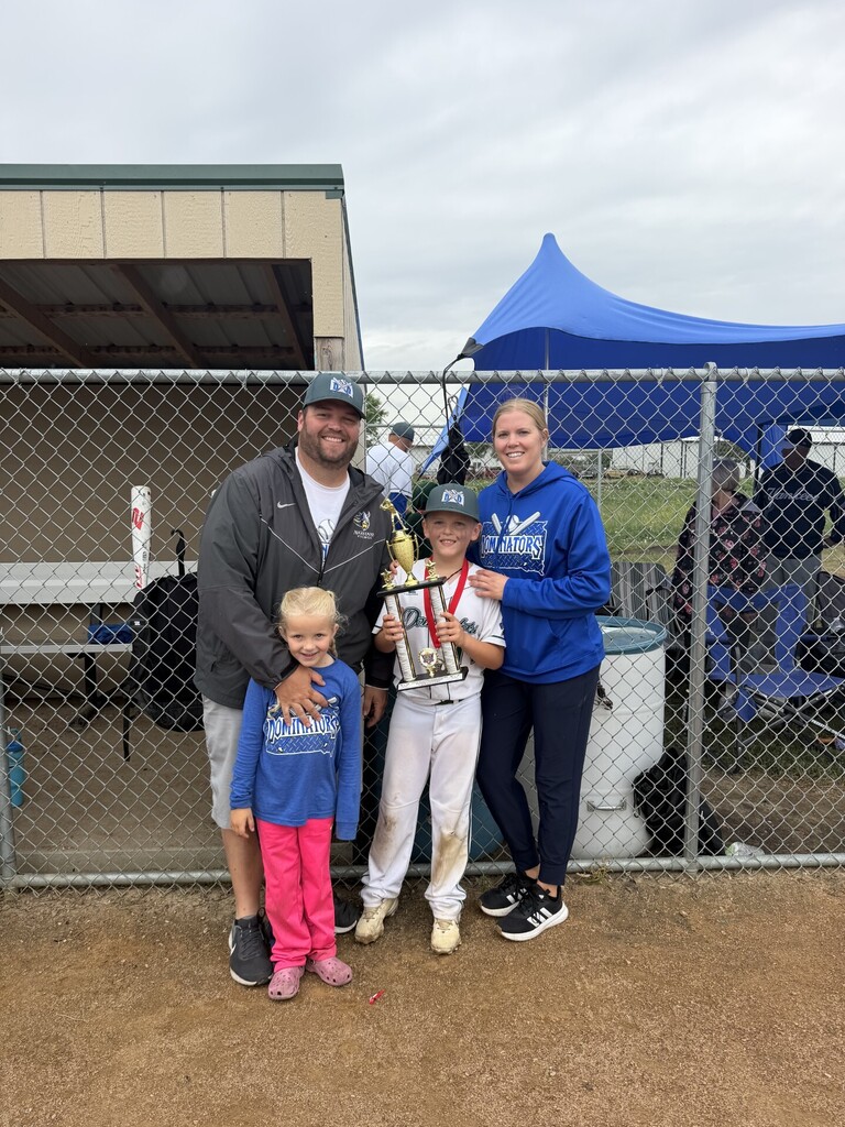 Miss Becky with her husband and two kids.