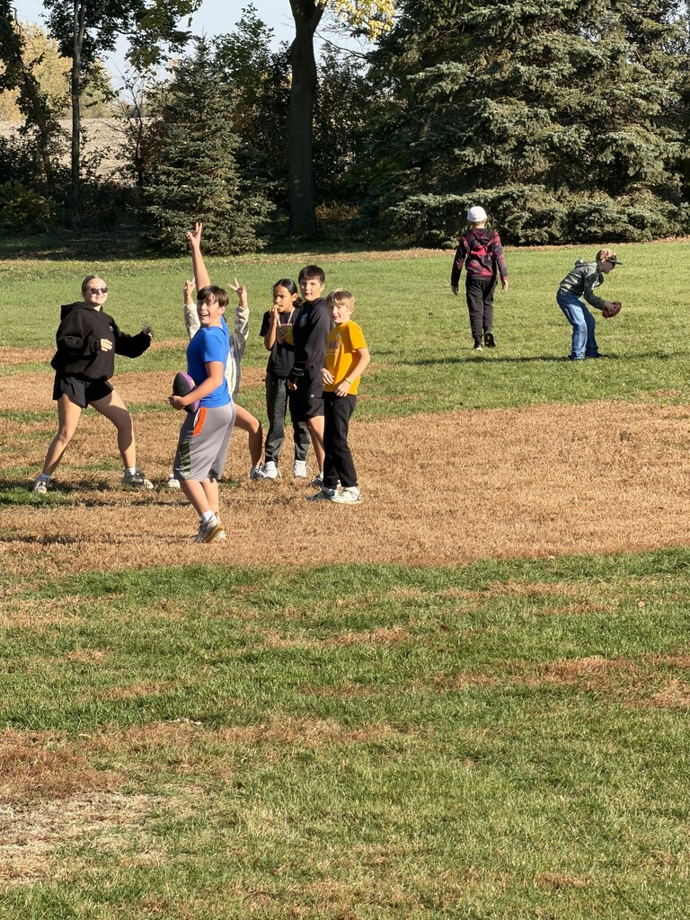 students on the field playnig football