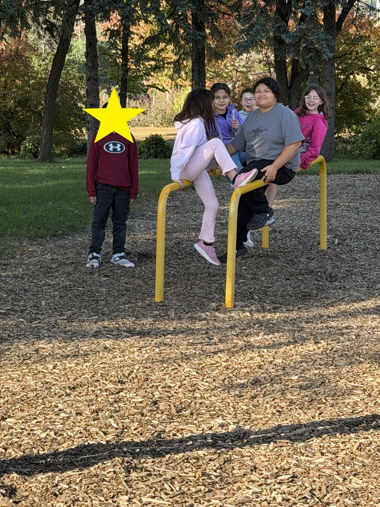 a group of students on some bars