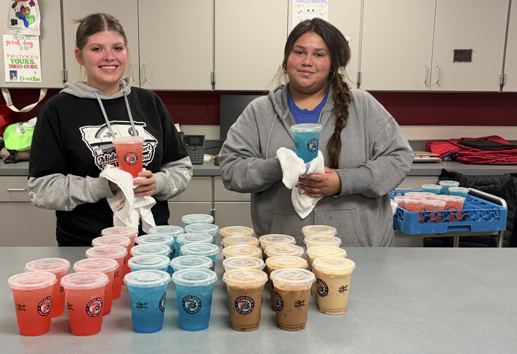 workers from 7Brew come to deliver drinks for staff at Laura Wilder