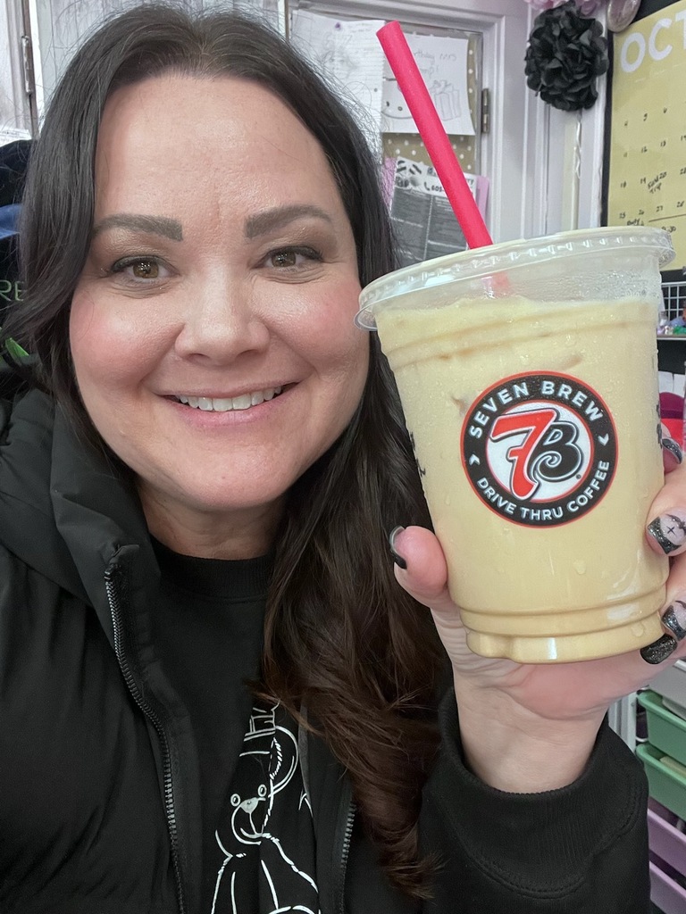 Woman holding a cup of coffee