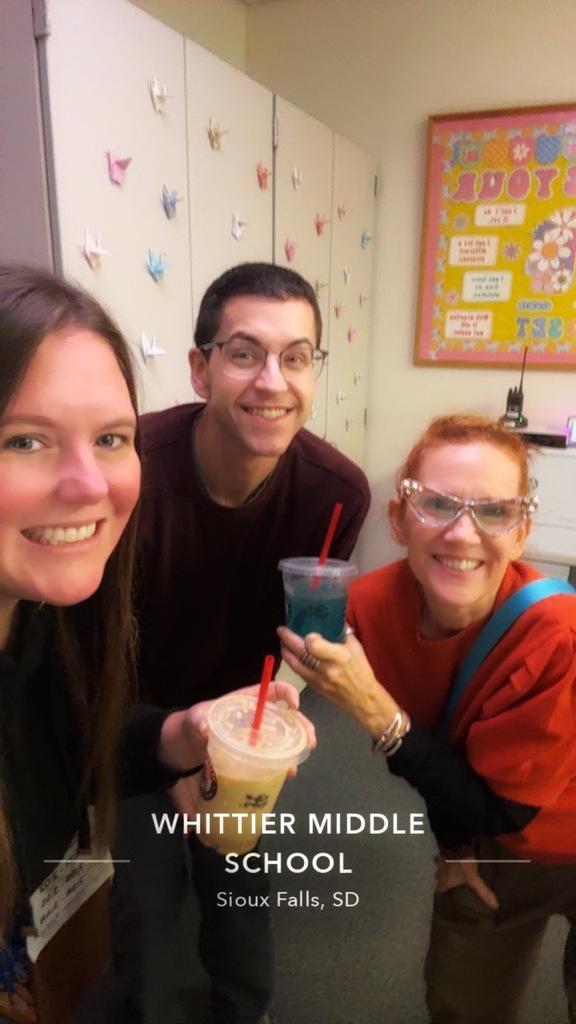 Group of people holding coffee