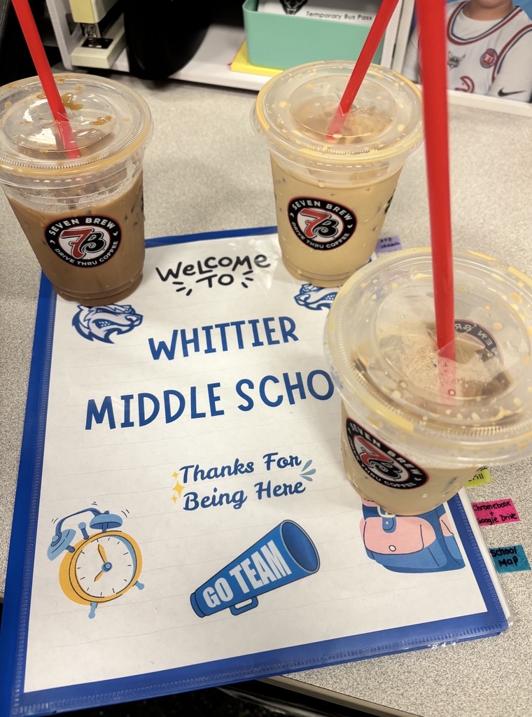 Three cups of coffee on a folder