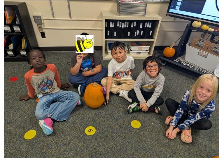 students doing pumpkin math