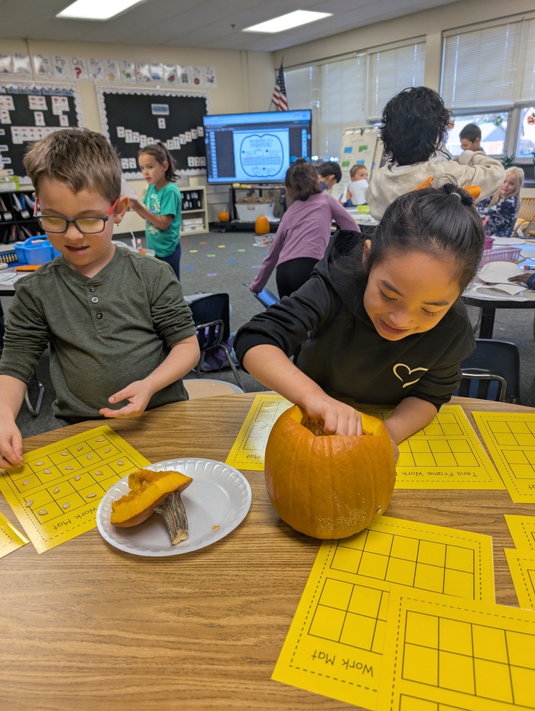 students doing pumpkin math