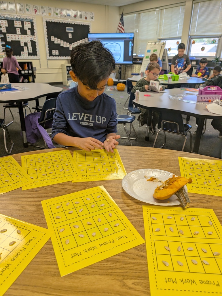 students doing pumpkin math