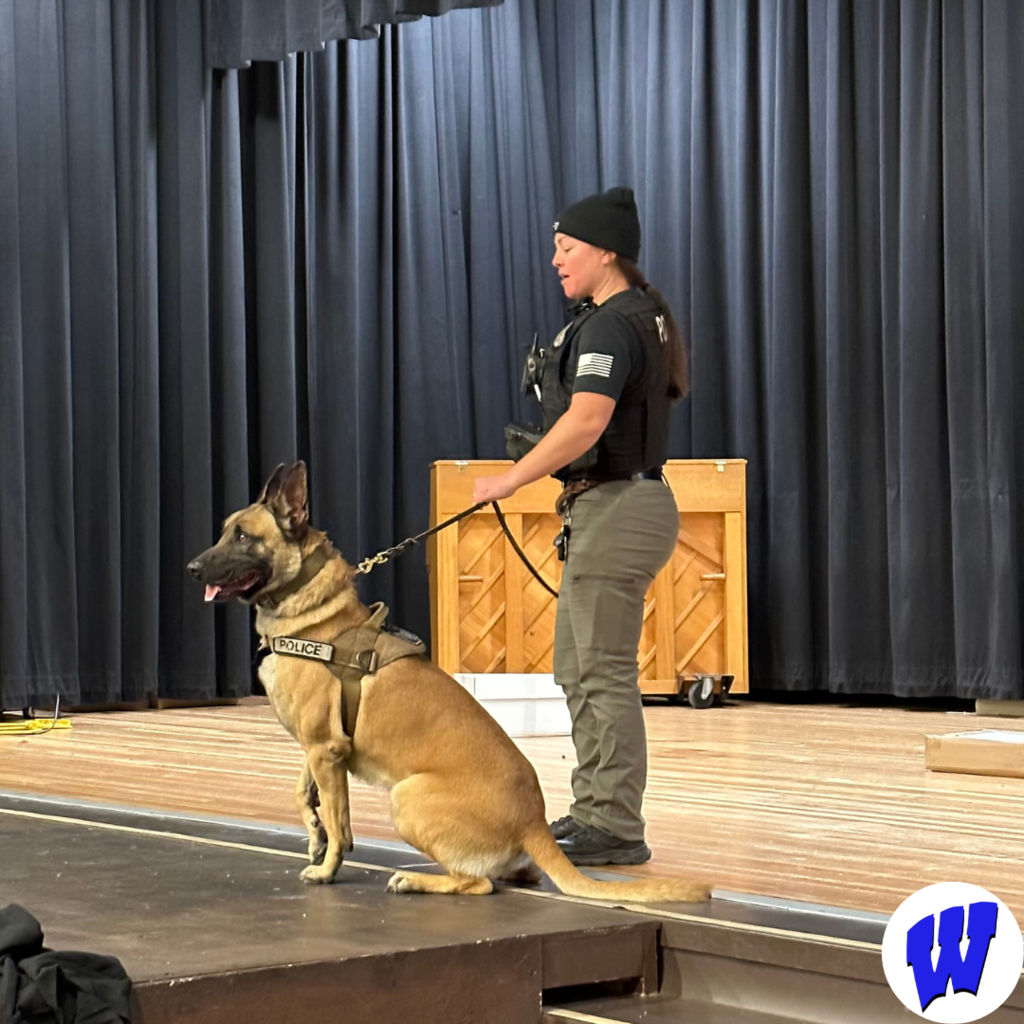 Officer Neal, K-9 Officer Fox, and dog, Rex, visited Whittier for a presentation to 8th grade students.