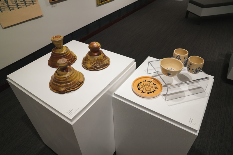 ceram ceramic works of art displayed on a white case as part of an art exhibit 