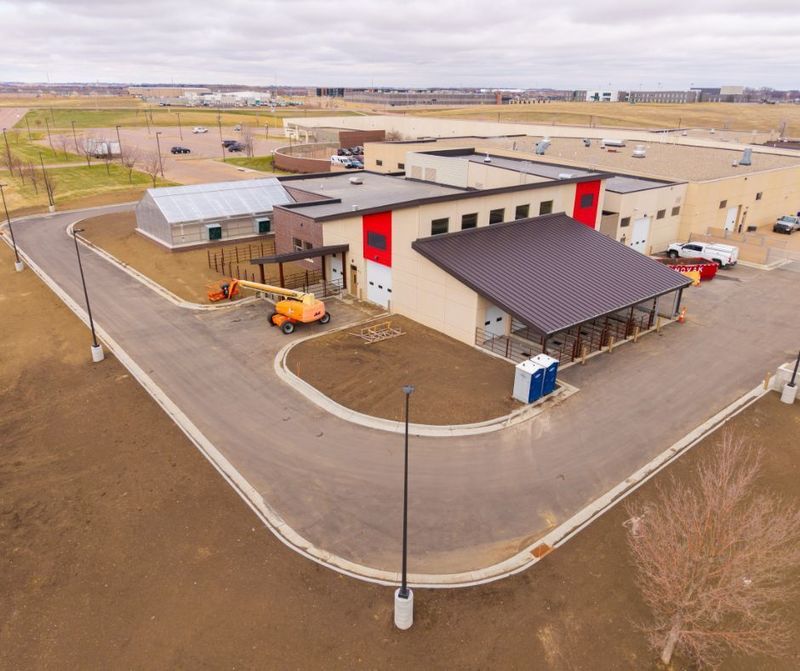Exterior drone shot of the almost-finished CTE Ag barn