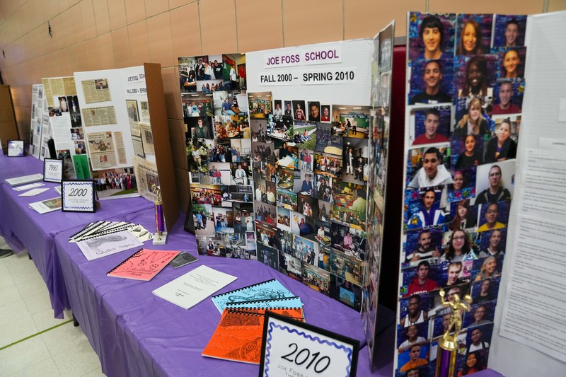 Poster boards showing the history of Joe Foss high school with student pictures