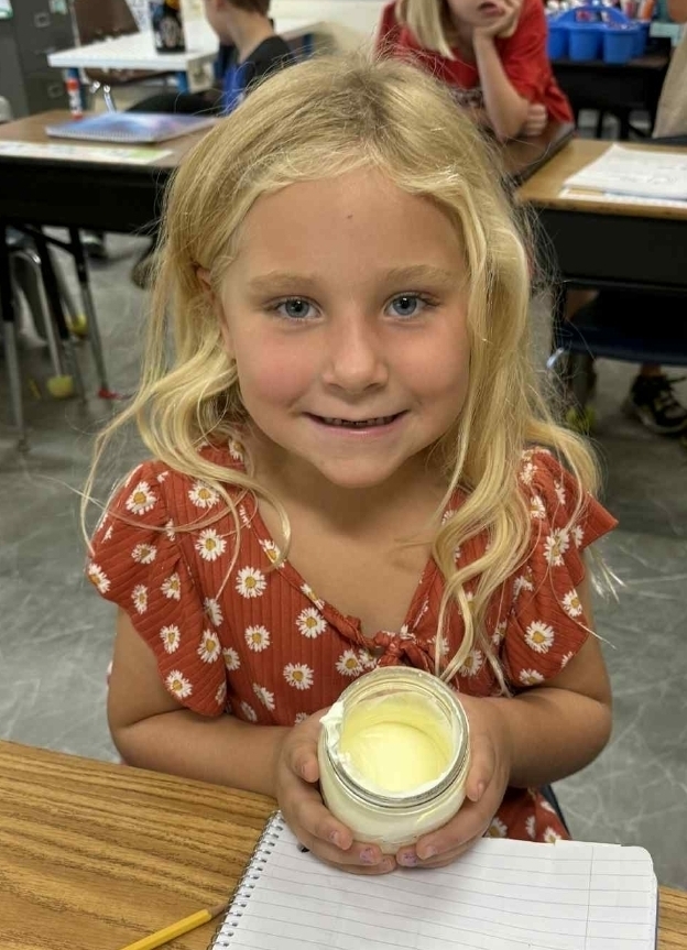 SIVELLS BEND ISD
Mrs. Downey’s 1st and 2nd grade have been reading books that talk about churning butter. So today, the whole class made some butter and tasted it on a cracker. It was delicious!!