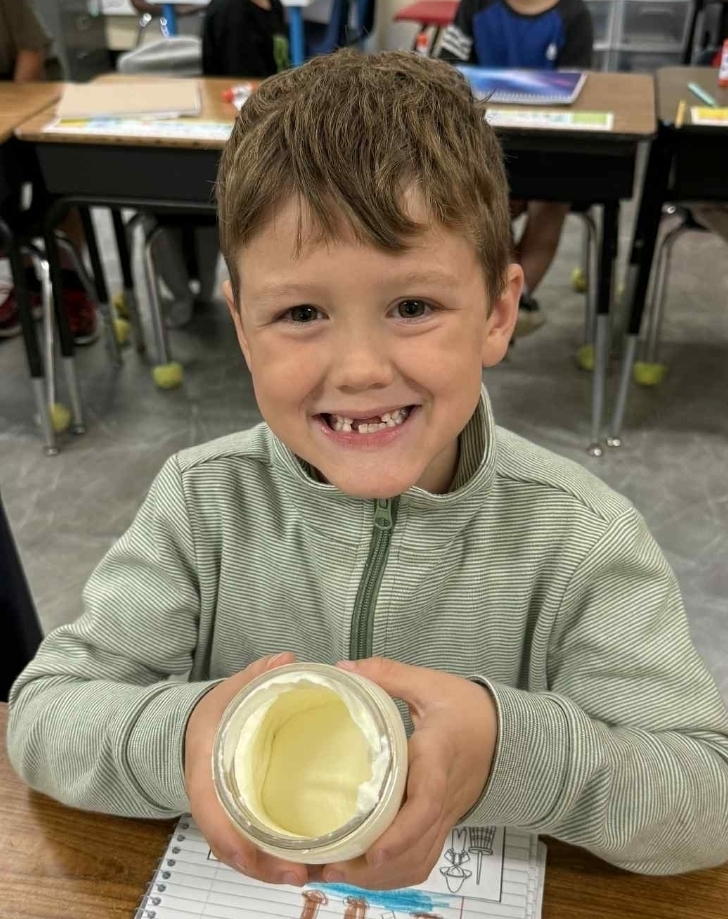 SIVELLS BEND ISD
Mrs. Downey’s 1st and 2nd grade have been reading books that talk about churning butter. So today, the whole class made some butter and tasted it on a cracker. It was delicious!!
