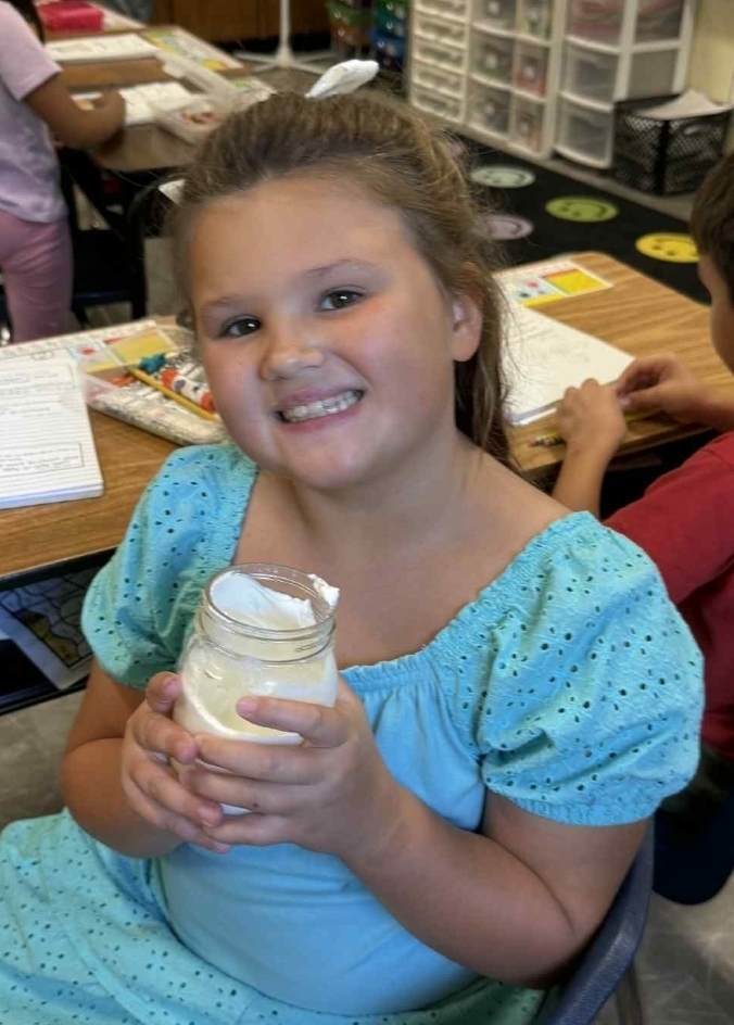 SIVELLS BEND ISD
Mrs. Downey’s 1st and 2nd grade have been reading books that talk about churning butter. So today, the whole class made some butter and tasted it on a cracker. It was delicious!!