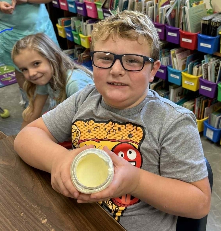 SIVELLS BEND ISD
Mrs. Downey’s 1st and 2nd grade have been reading books that talk about churning butter. So today, the whole class made some butter and tasted it on a cracker. It was delicious!!