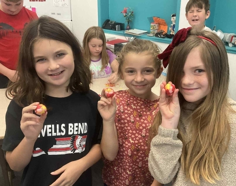SIVELLS BEND ISD
3rd and 4th graders made sediment out of Starburst candies.  Then they turned their sediment into sedimentary rock.  They warmed their sedimentary rocks and applied pressure to make metamorphic rocks.  Last of all, we melted some rock and made igneous rocks!  We had a blast!