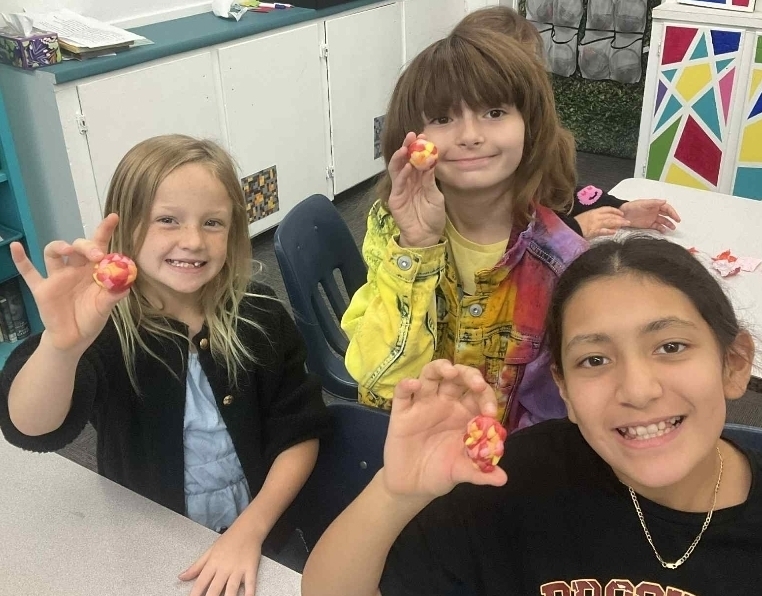 SIVELLS BEND ISD
3rd and 4th graders made sediment out of Starburst candies.  Then they turned their sediment into sedimentary rock.  They warmed their sedimentary rocks and applied pressure to make metamorphic rocks.  Last of all, we melted some rock and made igneous rocks!  We had a blast!