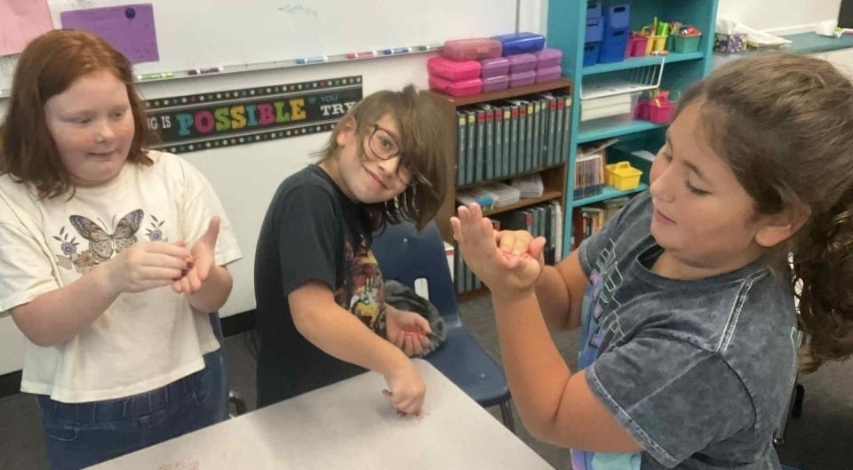 SIVELLS BEND ISD
3rd and 4th graders made sediment out of Starburst candies.  Then they turned their sediment into sedimentary rock.  They warmed their sedimentary rocks and applied pressure to make metamorphic rocks.  Last of all, we melted some rock and made igneous rocks!  We had a blast!