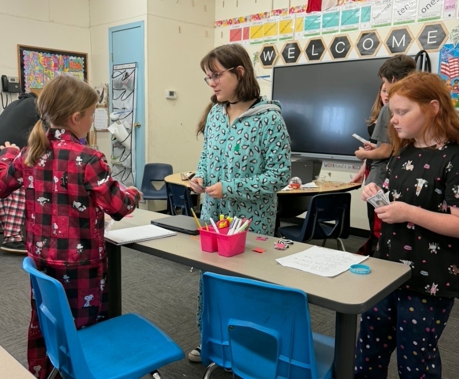 SIVELLS BEND ISD -

Students are learning about supply and demand.

For Social Studies and math, students made products for their shop. 

 They must pay for their products with $100 limit. They set their price. 

We have customers come to the class to purchase with fake money. 

Students will compete to see who made the most profit.