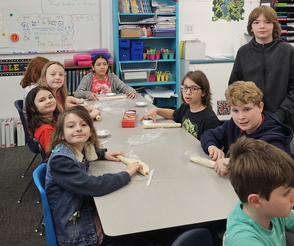 SIVELLS BEND ISD -
3rd, 4th, and 5th graders learned how to crimp pie crust dough around the edges and make a lattice topped pie & peel apples.  They learned about cherries and the cherry pitting tool.  They learned how cornstarch thickens the juices and a pinch of salt makes a pie better.  They learned that apple pies should be mounded before baking and berry pies should not!  We  had a crazy, noisy, wonderful day creating… and we aren’t done yet!  Stay tuned!