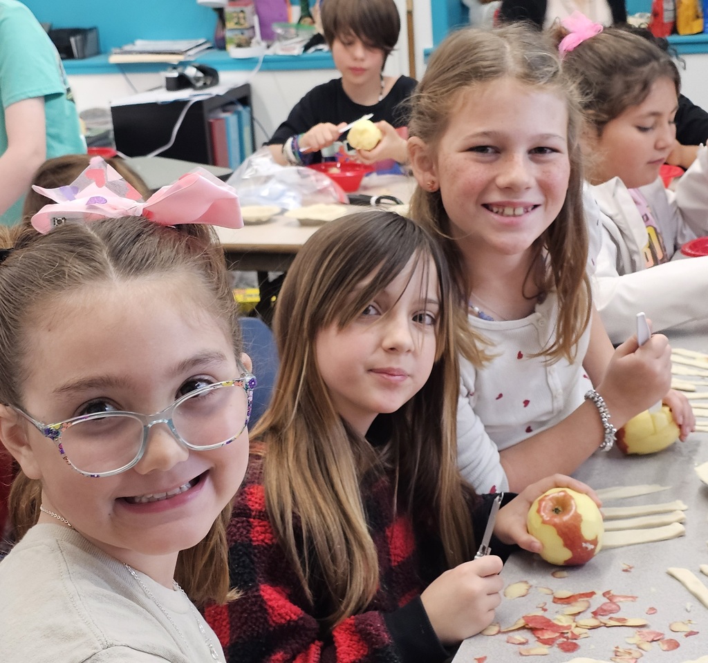 SIVELLS BEND ISD -
3rd, 4th, and 5th graders learned how to crimp pie crust dough around the edges and make a lattice topped pie & peel apples.  They learned about cherries and the cherry pitting tool.  They learned how cornstarch thickens the juices and a pinch of salt makes a pie better.  They learned that apple pies should be mounded before baking and berry pies should not!  We  had a crazy, noisy, wonderful day creating… and we aren’t done yet!  Stay tuned!