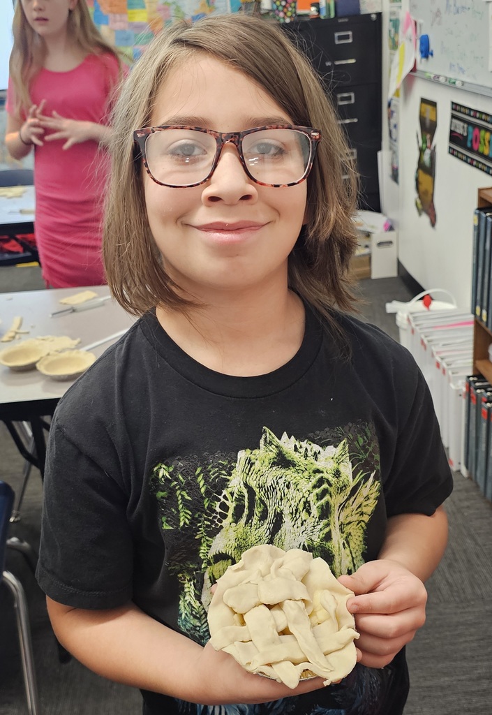SIVELLS BEND ISD -
3rd, 4th, and 5th graders learned how to crimp pie crust dough around the edges and make a lattice topped pie & peel apples.  They learned about cherries and the cherry pitting tool.  They learned how cornstarch thickens the juices and a pinch of salt makes a pie better.  They learned that apple pies should be mounded before baking and berry pies should not!  We  had a crazy, noisy, wonderful day creating… and we aren’t done yet!  Stay tuned!