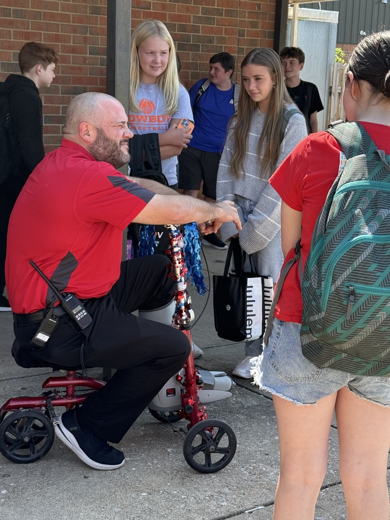 Our fearless leader, Mr. Scheihing recently broke his ankle. Don't worry, you can still find him out and about scooting around checking in on students.
