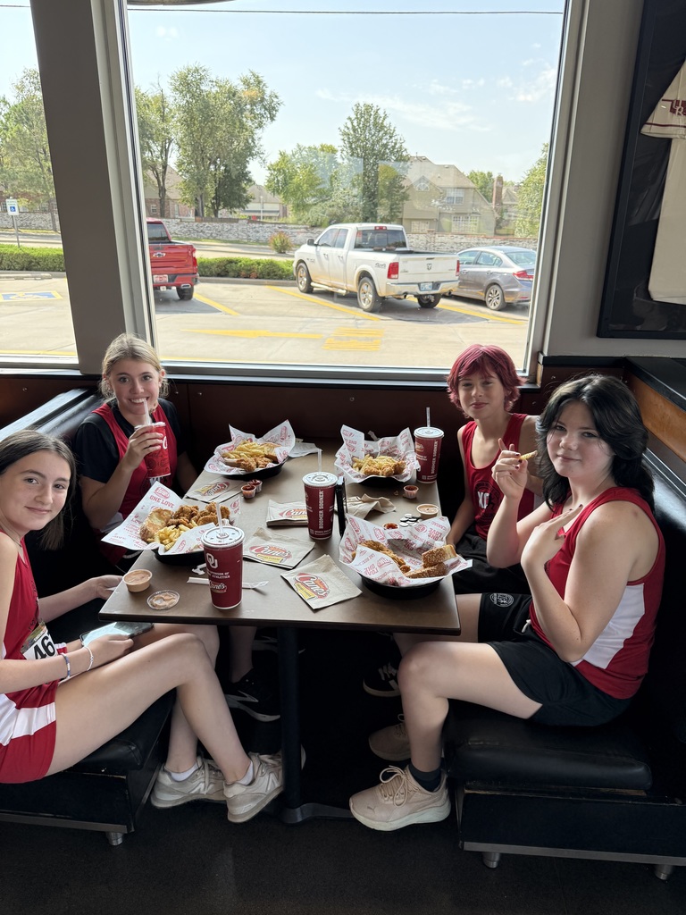athletes eating at Canes