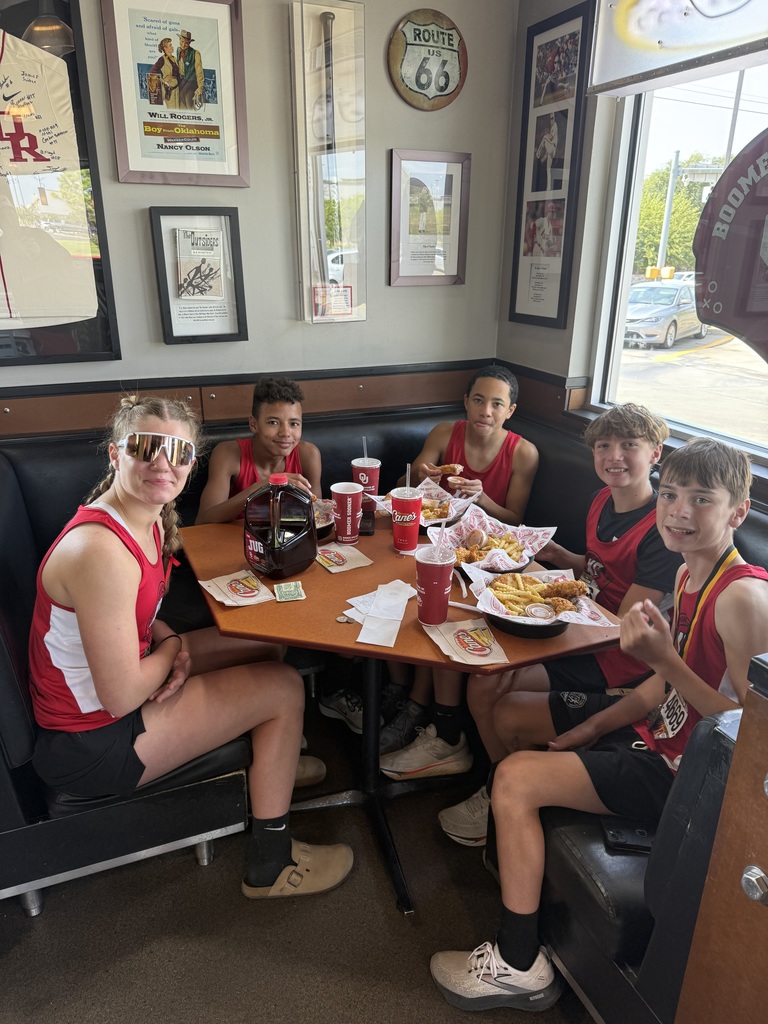 athletes eating at Canes