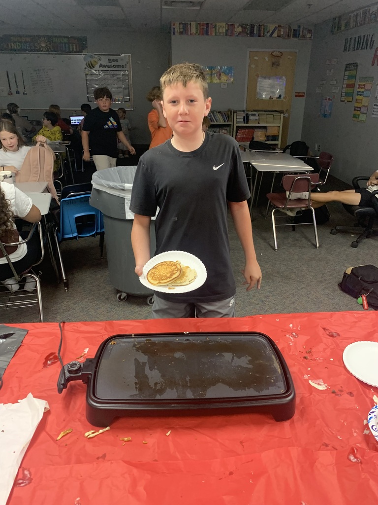 Postiers class making pancakes