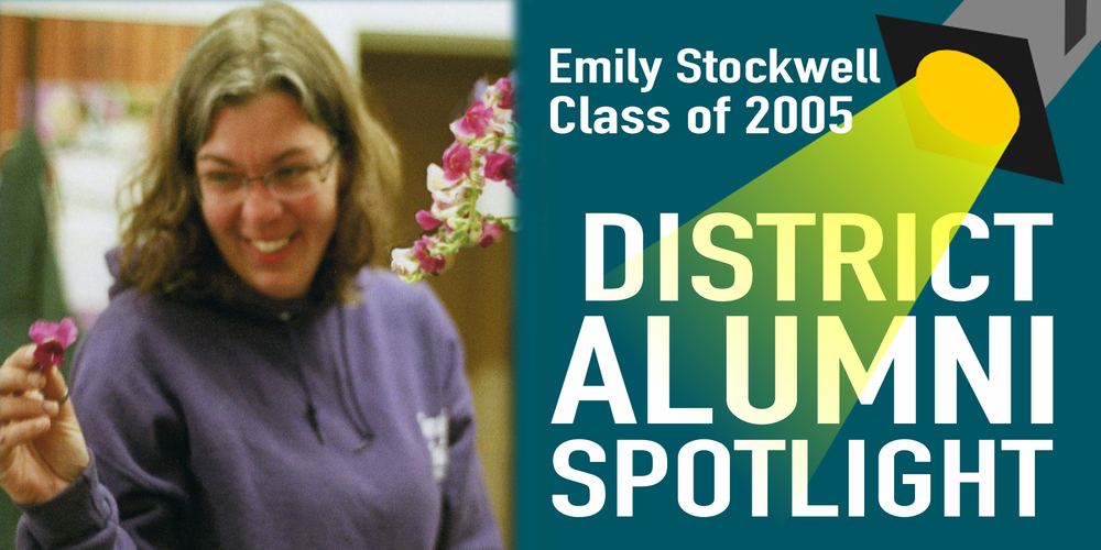 Graphic titled “District Alumni Spotlight” featuring Emily Stockwell, Class of 2005. On the left, Emily is smiling while holding a small pink flower, wearing glasses and a purple hoodie, with blurred flowers and a warm indoor background behind her. On the right, text reads “Emily Stockwell, Class of 2005” above a yellow spotlight shining onto the words “District Alumni Spotlight.”