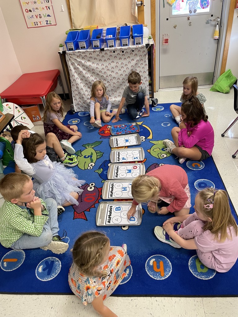 Kindergarten students recognizing letters