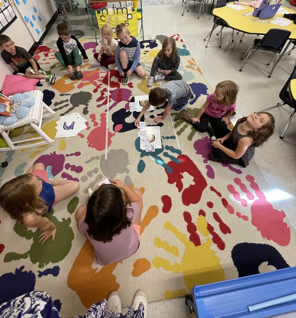 Kindergarten students working on letter sounds
