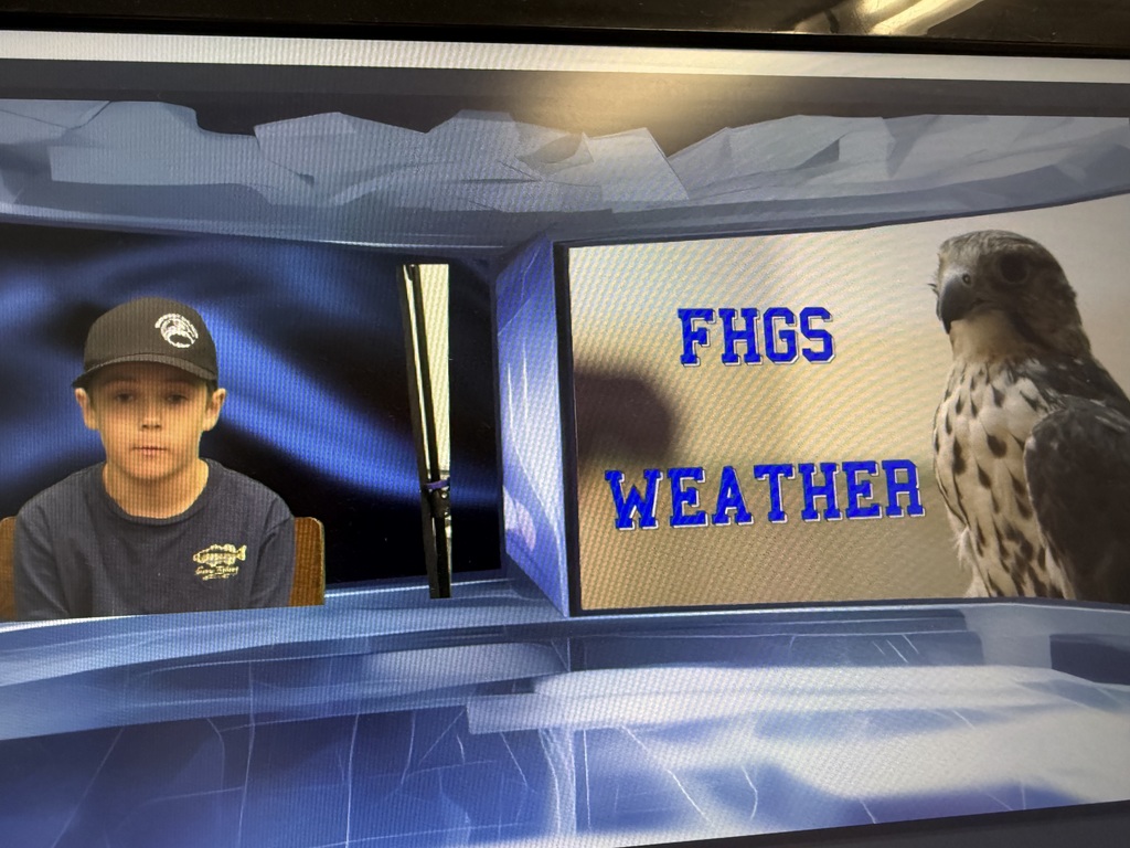 A boy wearing a navy shirt and a dark baseball cap sits on a chair. He is in front of a blue screen with a digital overlay that says "FHGS WEATHER" next to an image of a falcon
