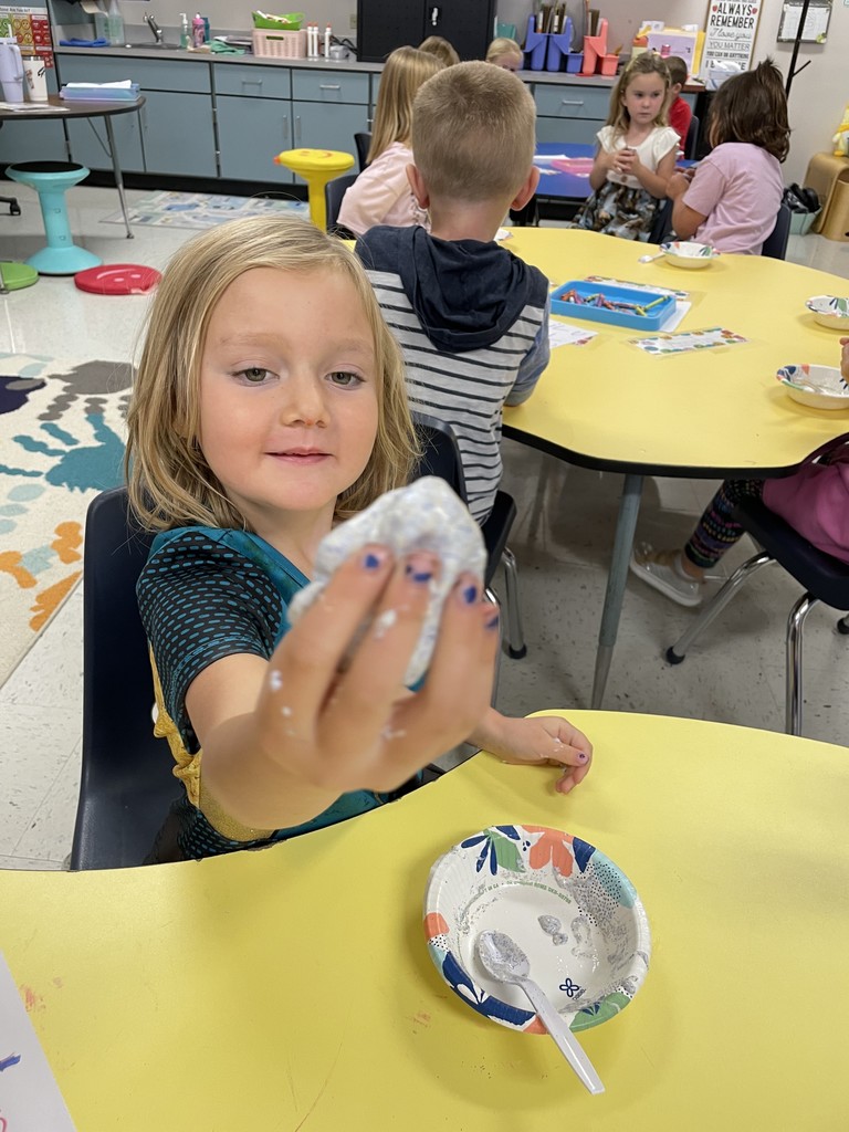 Kinders playing with slime
