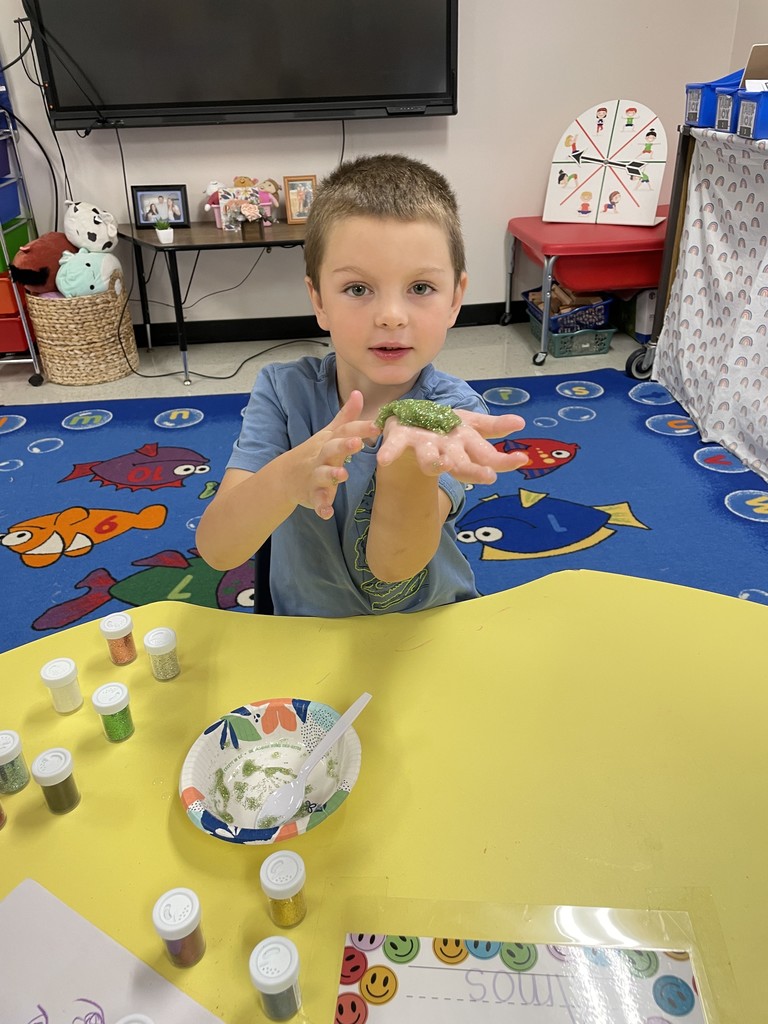 Kinders playing with slime