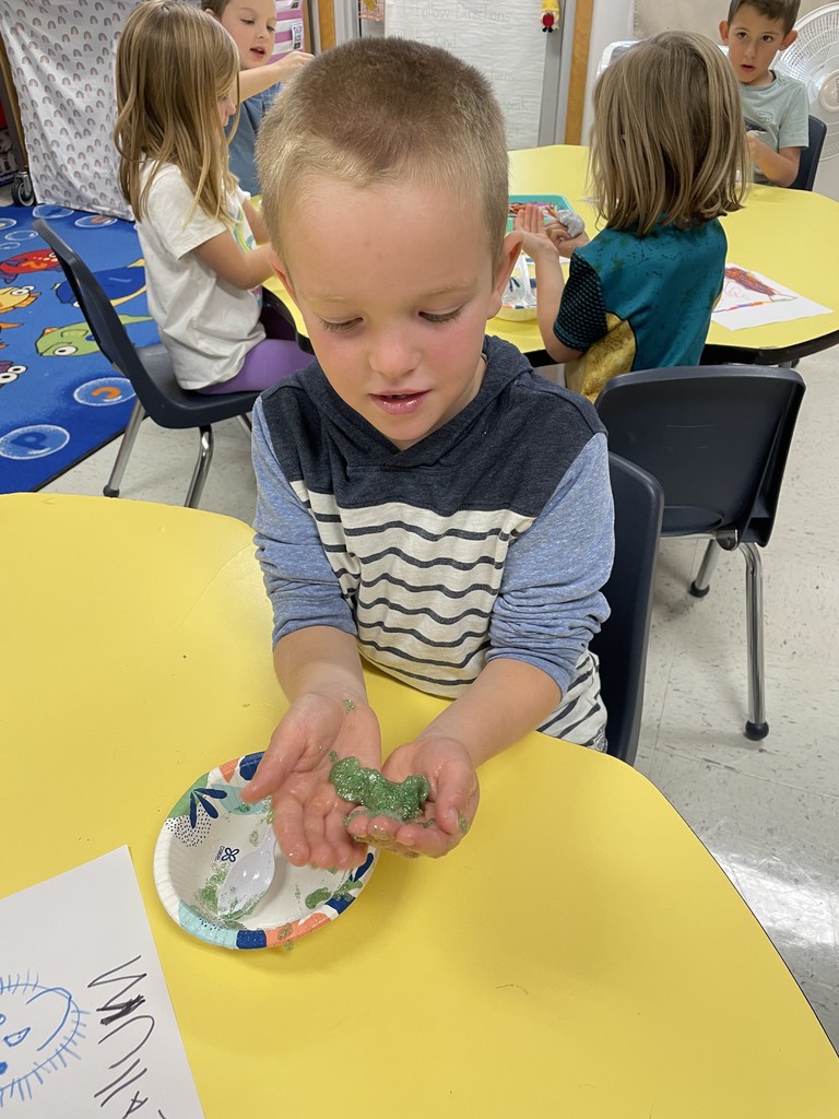 Kinders playing with slime