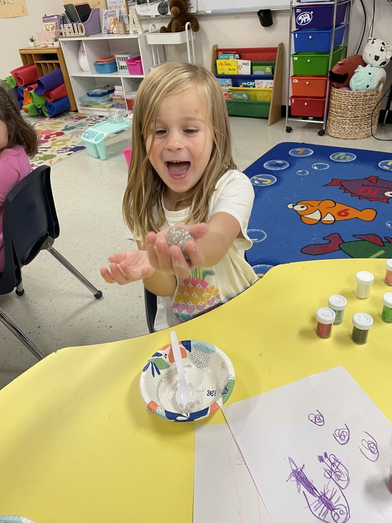 Kinders playing with slime