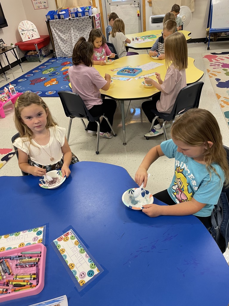 Kinders playing with slime