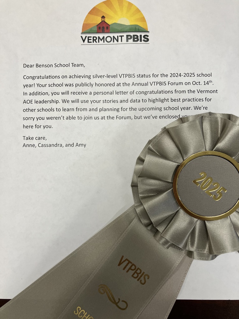 the image shows a congratulatory letter from Vermont PBIS to the Benson School Team for achieving silver-level status for the 2024-2025 school year, along with the silver-colored award ribbon for the achievement.